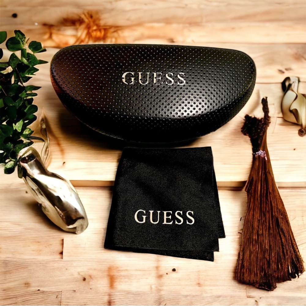 Guess sunglasses case and towelette’s